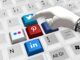 keyboard, hand, robot, social media, twitter, linkedin, pinterest, facebook, machine, tiktok, artificial intelligence, technology