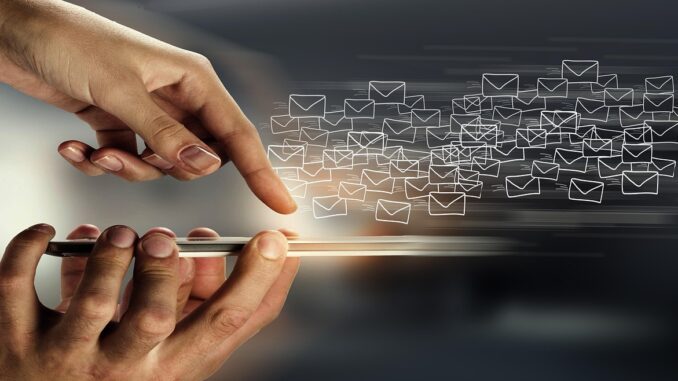 Photo by geralt email, mail, hand, smartphone, write, contact, spam, e-mails